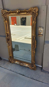 4' x 3.5' gold frame vintage plastic mirror