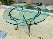 Load image into Gallery viewer, Amazing table brushed steel with gold animal hardware topped with 1” thick round glass top
