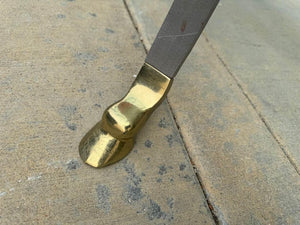 Amazing table brushed steel with gold animal hardware topped with 1” thick round glass top